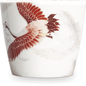 Tekop med trane motiv